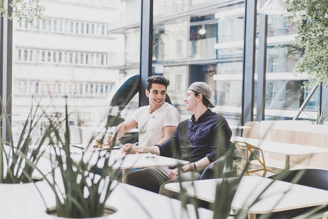 People in relaxed work bilateral meeting