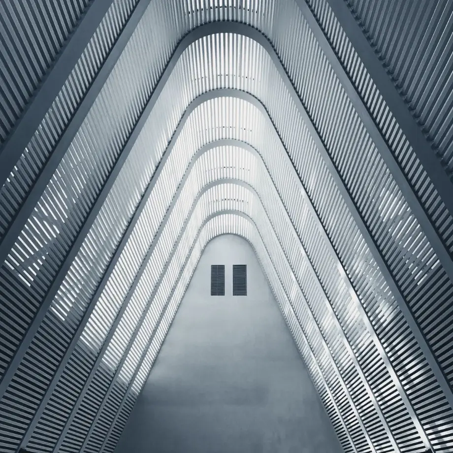 Looking up through a tall office atrium to a skylight, for AWA’s office lease expiry guide